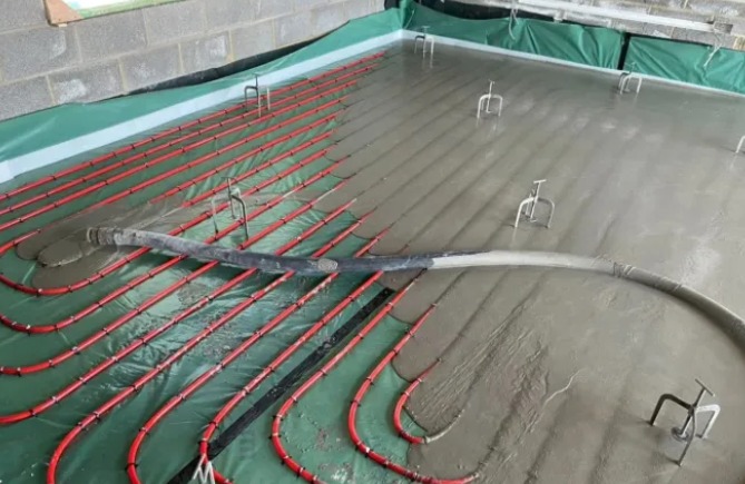 Flowing Concrete Over Underfloor Heating Pipes
